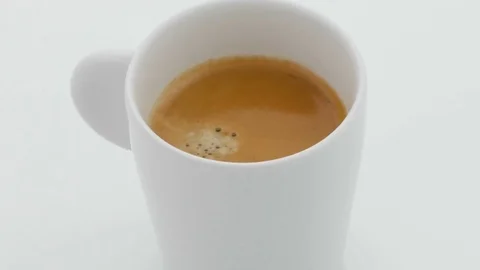 Coffe on Turntable - White Background Stock Footage 75727147