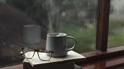 Coffee accompanied by rain Stock Footage 243372470