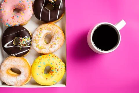 Coffee and appetizing doughnuts. Stock Photos