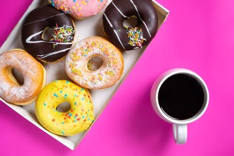 Coffee and appetizing doughnuts. Stock Photos