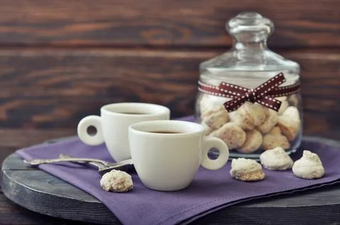 Coffee and biscotti Stock Photos