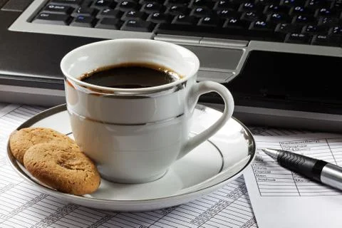 Coffee and biscuits Stock Photos