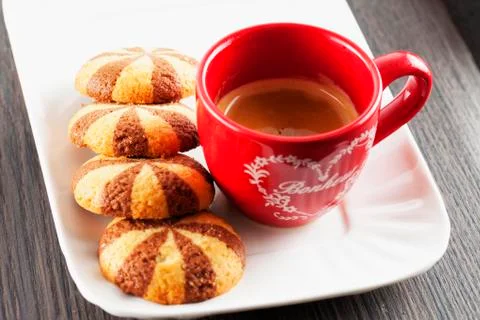 Coffee and biscuits Stock Photos