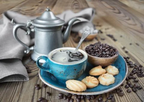 Coffee and biscuits Stock Photos
