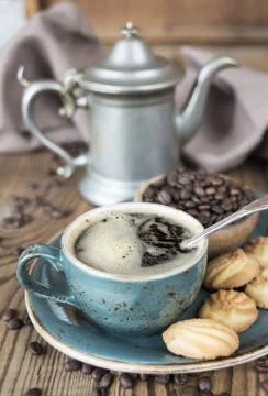 Coffee and biscuits Stock Photos