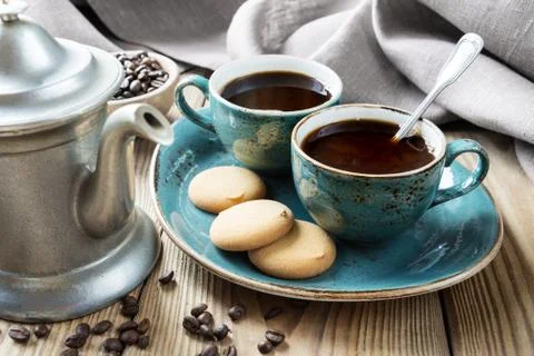 Coffee and biscuits Stock Photos