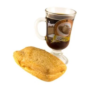 Coffee and bun Stock Photos