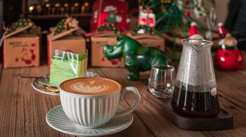 Coffee And Cakes Serverved On The Table With Christmas Decorations 스톡 사진