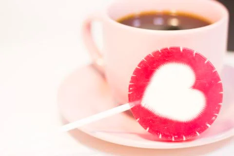 Coffee and candy on white Stock Photos