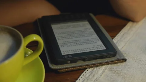 Coffee and Chinese e-book under the lights 스톡 동영상 162978958