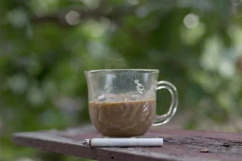 Coffee and cigarette Stock Photos