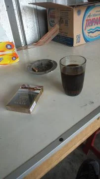 Coffee And Cigarette Stock Photos