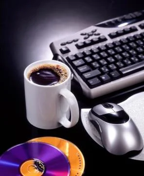 Coffee and computer Stock Photos