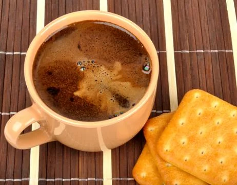 Coffee and crackers Stock Photos