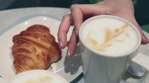 Coffee and croissant. Stock Footage 219820997