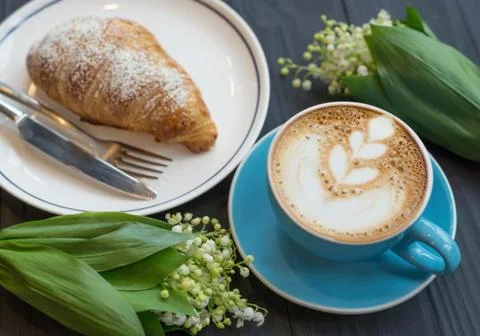 Coffee and croissant the rustic background Stock Photos