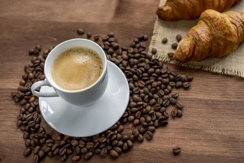 Coffee and croissants Stock Photos