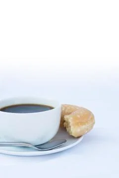 Coffee and donuts Stock Photos