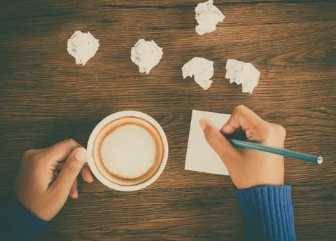 Coffee and hand writing Stock Photos