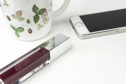  coffee and laptop computer, notebook ,iPhone ,lipgloss Stock Photos