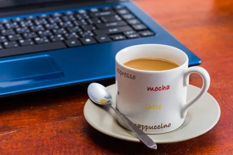 Coffee and laptop Stock Photos