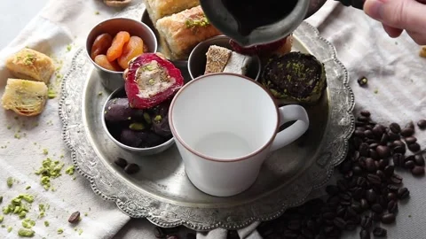 Coffee and middle eastern sweets. Traditional arabic  desserts, Ramadan sweets Stock Footage 257759703