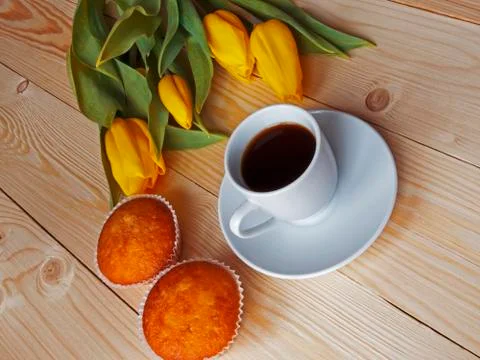 Coffee and muffins on the table Stock Photos