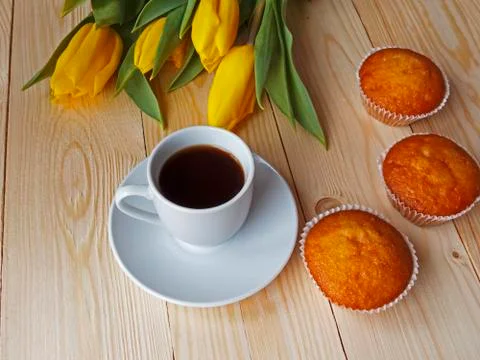 Coffee and muffins on the table 写真素材
