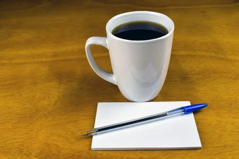Coffee and note pad Stock-Fotos