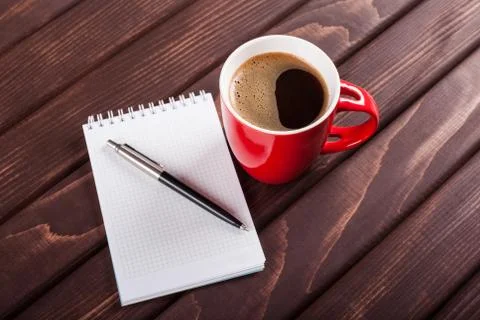 Coffee and notebook Stock Photos