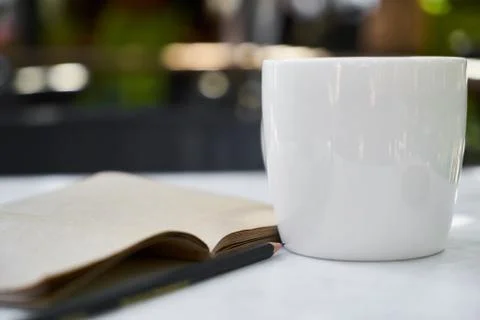 Coffee and Notebook Stock-Fotos