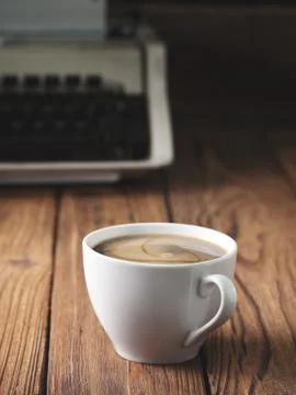 Coffee and old typewriter Stock Photos