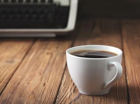 Coffee and old typewriter Stock Photos