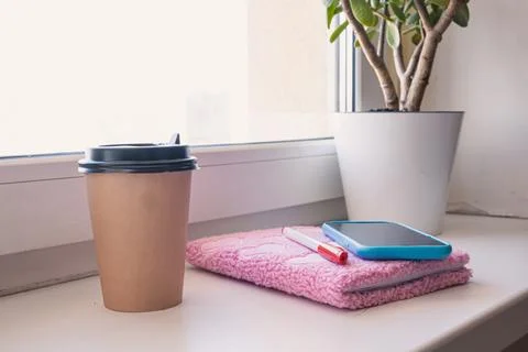 Coffee and smartphone with notebook for work life balance Stock Photos