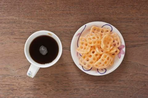 Coffee and sweet crispy Stock Photos