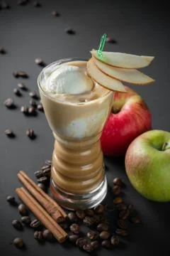Coffee-Apple milkshake on dark background Stock Photos