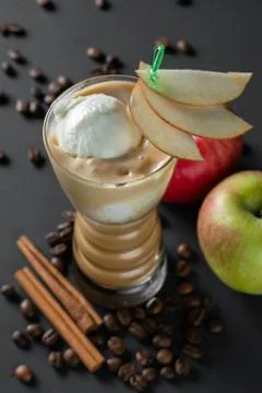 Coffee-Apple milkshake on dark background Stock Photos