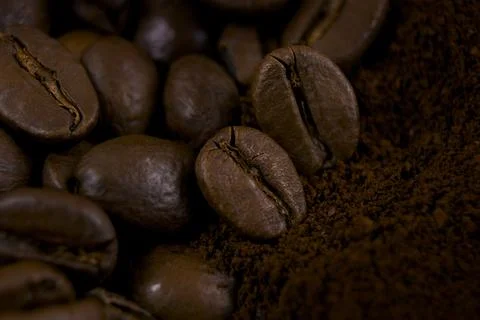 Coffee background. Close up of roasted coffee. Soft focus. Stock Photos