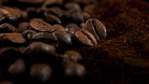 Coffee background. Close up of roasted coffee. Soft focus Stock Photos