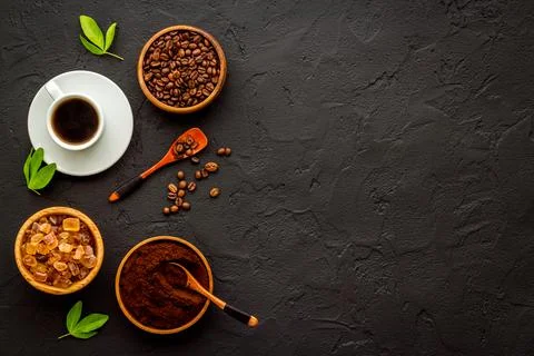 Coffee background. Coffee beans and hot drink, top view Stock Photos