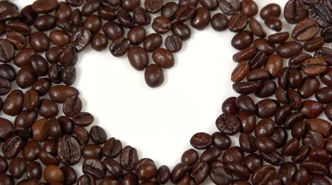 Coffee background. coffee beans fall. heart of the coffee beans Stock-Footage 56689075