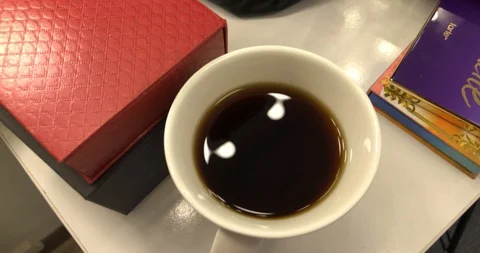 Coffee background with cup on table Vidéo 104967871