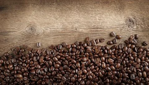 Coffee background on rustic wooden texture. Flat lay, copy space Stock Photos