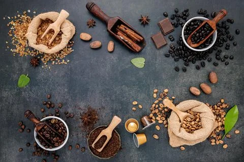 Coffee background with various of roasted coffee beans and flavourful ingredi 스톡 사진