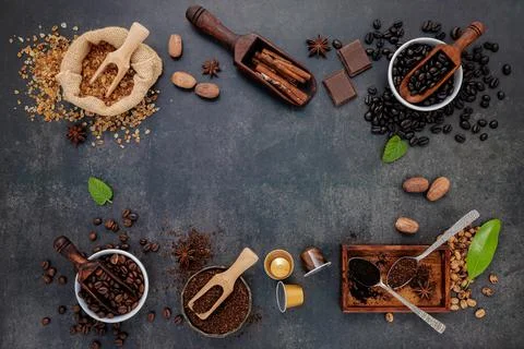 Coffee background with various of roasted coffee beans and flavourful ingredi Stock Photos