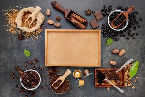 Coffee background with various of roasted coffee beans and flavourful ingredi Stock Photos