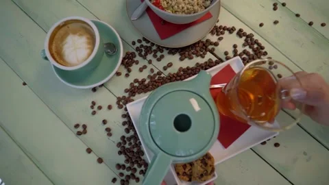 Coffee bar with coffee beans and delicious breakfast in beautiful setting Stock Footage 142287985