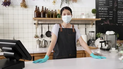 Coffee bar owner in protective mask Stock Footage 205873796