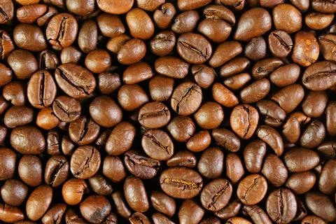 Coffee bean background. Coffee is the most popular drink of modern people. .. Stock Photos