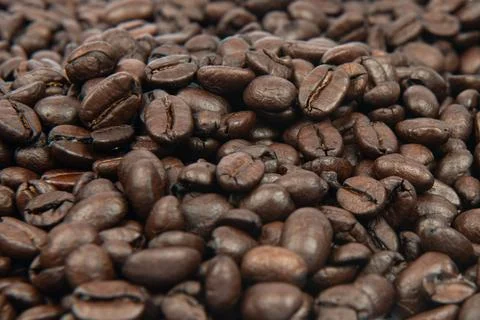 Coffee bean background. Roasted coffee beans on the entire surface. Brown c.. Foto stock